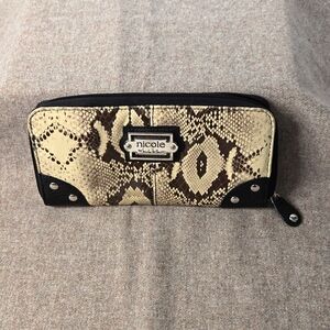 Nicole by Nicole Miller snake skin wallet.